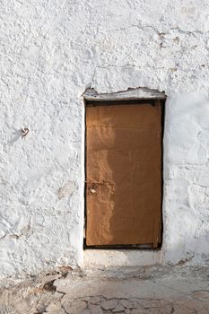 Door of a rustic house, in a village of Andalusia in southern Spain