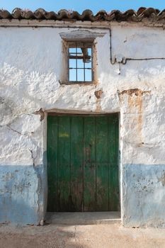 Door of a rustic house, in a village of Andalusia in southern Spain