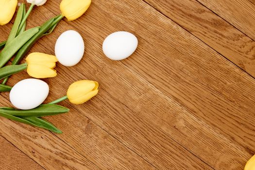 tulip bouquet white eggs decoration wooden background holiday. High quality photo