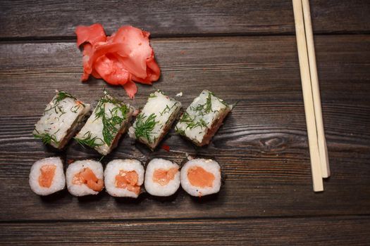 stuffed sushi rolls seafood wasabi ginger asian food. High quality photo
