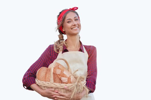 Woman dressed apron white background Farmer bread basket Agricultural concept Caucasian middle age Female business owner in uniform Happy one person smiling Time to advertise Banner Thumb up