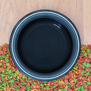 Top view dry food for cat and dog with empty bowl
