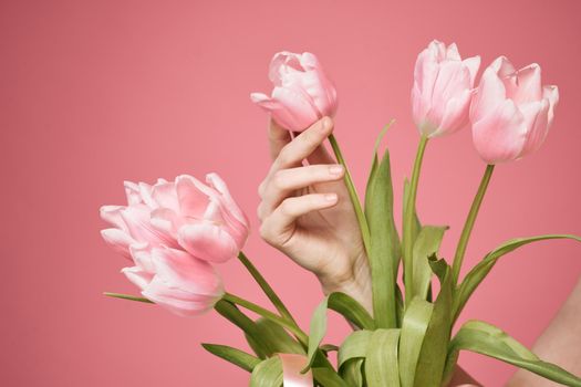 Bouquet of flowers pink background holiday gift. High quality photo