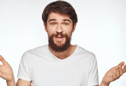 man on white background cropped view white t-shirt Copy Space. High quality photo