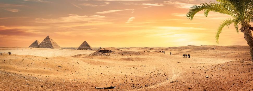 Egyptian pyramid in sand desert and clear sky