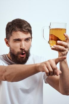 Cheerful man mug beer alcohol drunk lifestyle. High quality photo