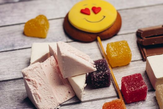 gingerbread in the form of a smiley on a stick marmalade sweets dessert. High quality photo