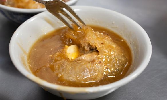 Taiwanese meatball - Delicious street food Bawan (Ba wan), steamed and deep fried starch wrapped round shaped dumpling with pork inside