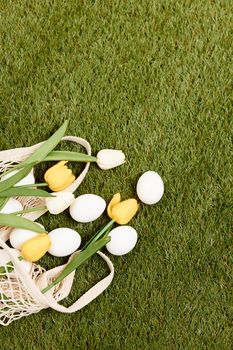 Easter eggs on the grass holiday spring christian day. High quality photo