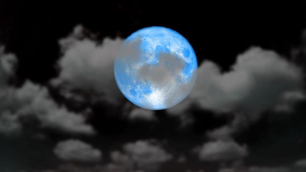 full cold blue moon rise back blur dark cloud on the night sky, Elements of this image furnished by NASA