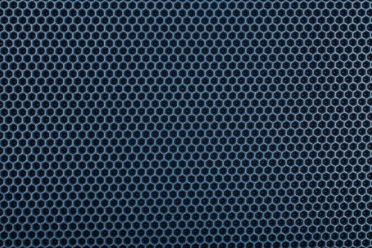 blue hexagonal punched EVA - ethylene vinyl acetate foam carpet, flat full frame texture and background.