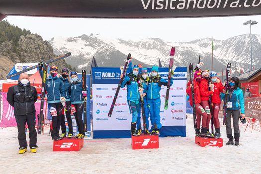 Arinsal, Andorra : 2021 March 3 : Final podium with the teams of France, Switzerland and Italy in the ISMF WC Championships Comapedrosa Andorra 2021- Relay Race Women.