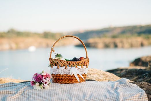 picnic in nature with a basket of delicious products