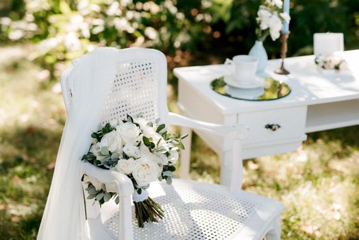 elegant wedding bouquet of fresh natural flowers and greenery