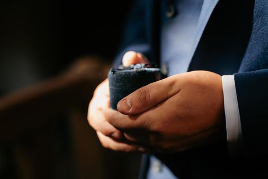 groom tenderly hold hands between them love and relationships