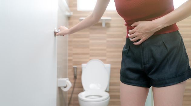 Woman, stomachache diarrhea symptom, menstrual period cramp or food poisoning. Health care concept.