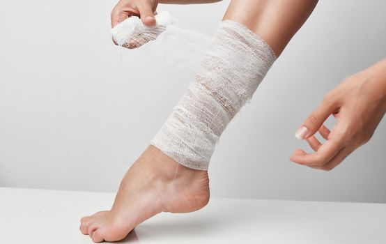 summer injury female leg bandage health problems pain. High quality photo