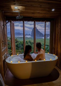 Couple in love spending time together in the house. Romantic moments in the bathroom on vacation at Phangga Thailand. men and woman on vacation Thailand Asia Phangnga bay