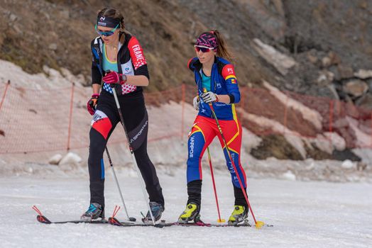 Arinsal, Andorra: 2021 March 4 : SEBASTIA BELLOBI Laia AND and POLLET VILLARD Marie FRA in the finish line ISMF WC Championships Comapedrosa Andorra 2021 Vertical Race.