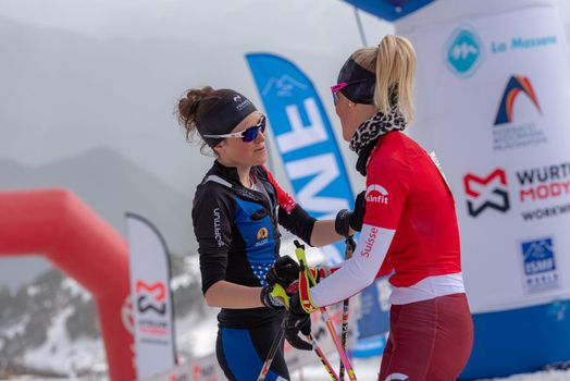 Arinsal, Andorra: 2021 March 4 :  KREUZER Victoria SUI and GACHET MOLLARET Axelle FRA in the finish line ISMF WC Championships Comapedrosa Andorra 2021 Vertical Race.