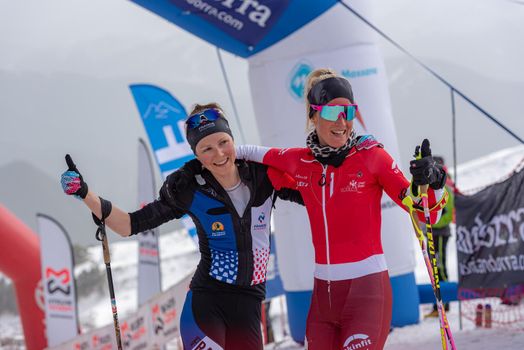 Arinsal, Andorra: 2021 March 4 :  KREUZER Victoria SUI and GACHET MOLLARET Axelle FRA in the finish line ISMF WC Championships Comapedrosa Andorra 2021 Vertical Race.