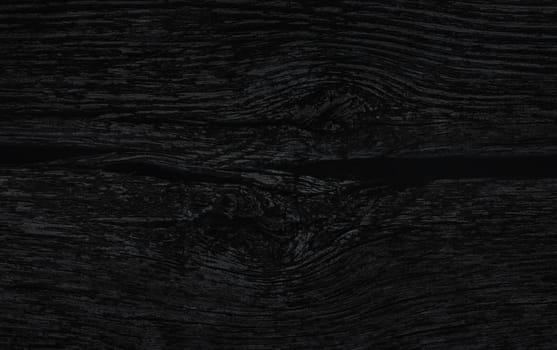 Texture of an old wooden wall. Rustic wood planks background. Image in dark tonality