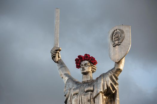 KIEV, UKRAINE - May. 08, 2015: Poppies of memory. The monument "Mother Motherland" decorated with a wreath of poppies on the Day of Remembrance and Reconciliation in Kiev