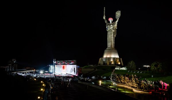 KIEV, UKRAINE - May. 08, 2015: Memorial and art event "The first minute of the world" on the occasion of the Day of Remembrance and Reconciliation devoted to Great Patriotic War of 1941-1945 at night