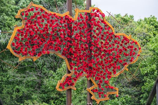 
KIEV, UKRAINE - May. 08, 2015: Installing "Ukraine... War...", open during the action "Poppies of memory" on the Day of Remembrance and Reconciliation in Kiev