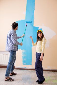 Husband and wife doing renovation at home