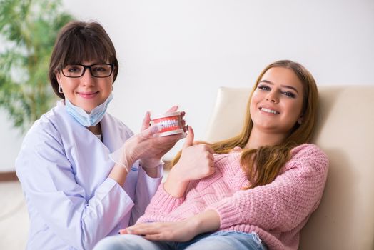 Woman patient visiting dentist for regular check-up
