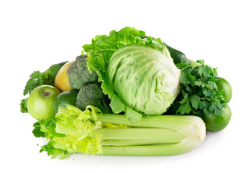 green fruits and vegetables on white background