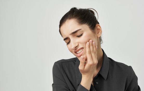 woman with displeased facial expression dental pain health problems dentistry. High quality photo