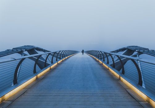 London's Millennium Bridge on a foggy morning