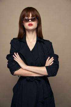 Stylish Woman Forbidden hands bright makeup dark glasses cropped view