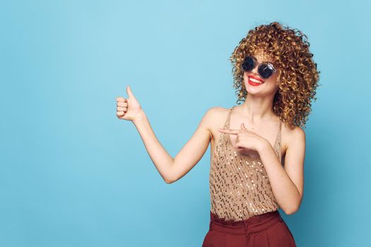 Pretty woman Hands gesture curly hair smile Copy Space charm cropped view