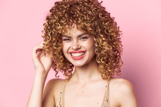 Model Curly hair smile red lips fun bright makeup cropped view