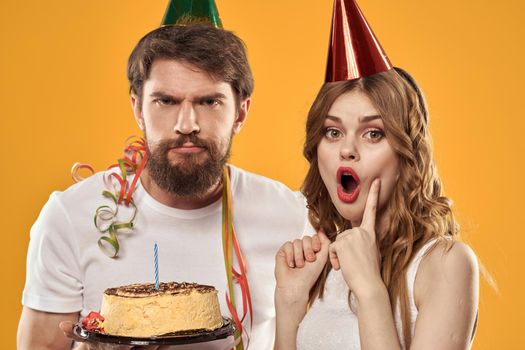 Merry time holiday cake different birthday yellow background. High quality photo