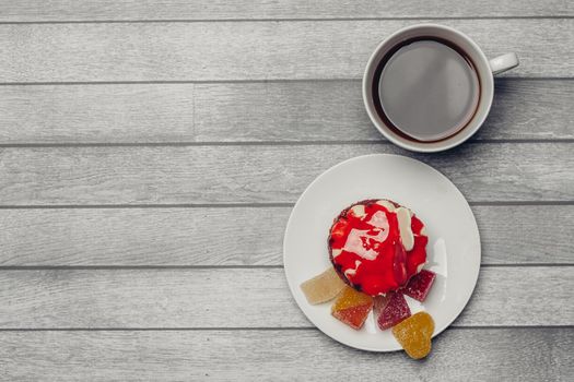 red cake on a plate dessert sweets candy snack close-up. High quality photo