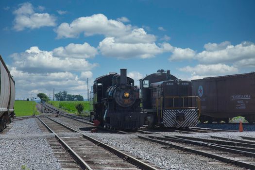 Strasburg, Pennsylvania, July 2018 - A 1906 Steam Locomotive and a Diesel Locomotive Seating Side by Side