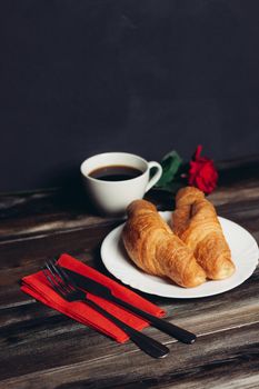 fresh croissants serving table breakfast dessert coffee. High quality photo