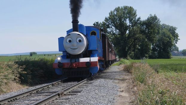 Ronks, Pennsylvania, June 2019 - Aerial View of Thomas the Tank Engine Puffing and Steaming along the Countryside