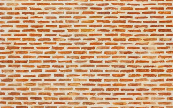 Beautiful brick wall texture with white cement joints, brick background