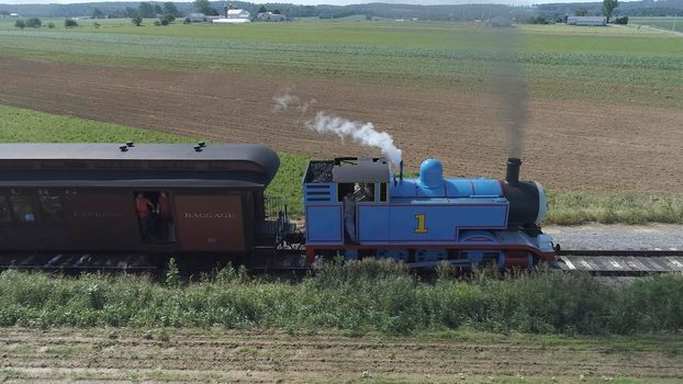 Ronks, Pennsylvania, June 2019 - Aerial View of Thomas the Tank Engine Puffing and Steaming along the Countryside