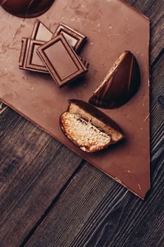chocolate bar delicacy sweets cocoa gastronomia wooden background. High quality photo