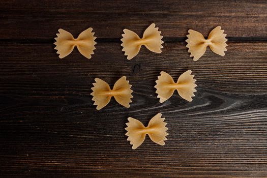 ingredients for italian pasta cherry tomatoes cutting board food preparation. High quality photo