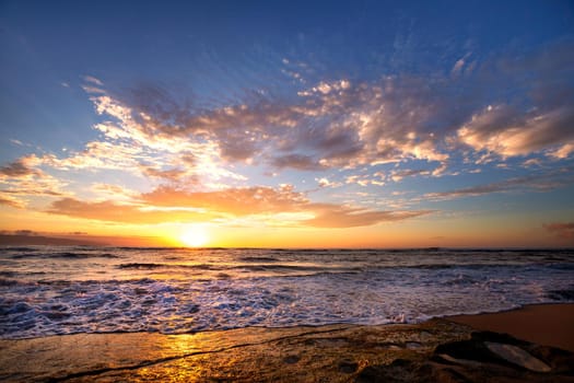 waves breaking on rocks after sunset close to Sunset beach, Oahu, Hawaii