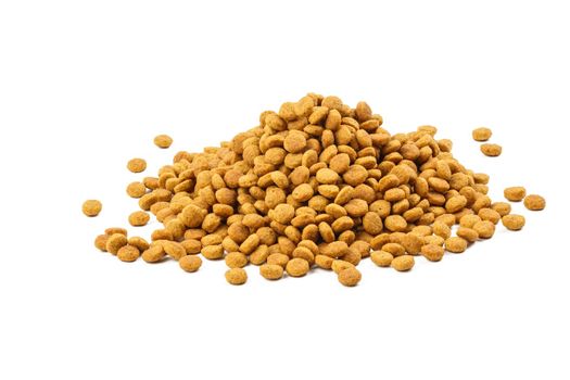 small pile of dry cat food crockets - isolated on white background.