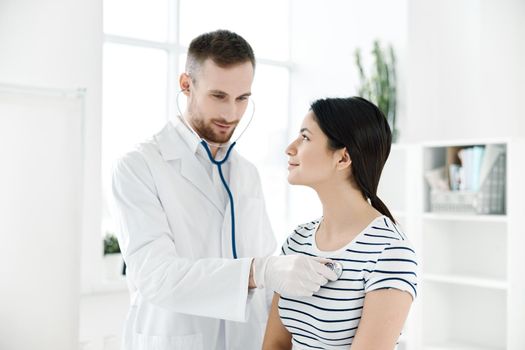 male doctor examines a patient in health hospitals. High quality photo