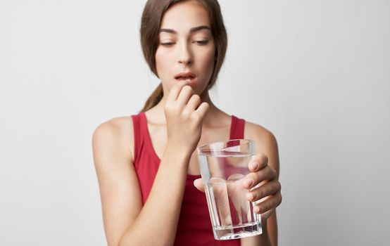 sick woman in red t shirt health problems cold handkerchief. High quality photo